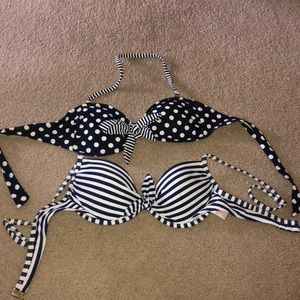 Two blue and white bikini tops
